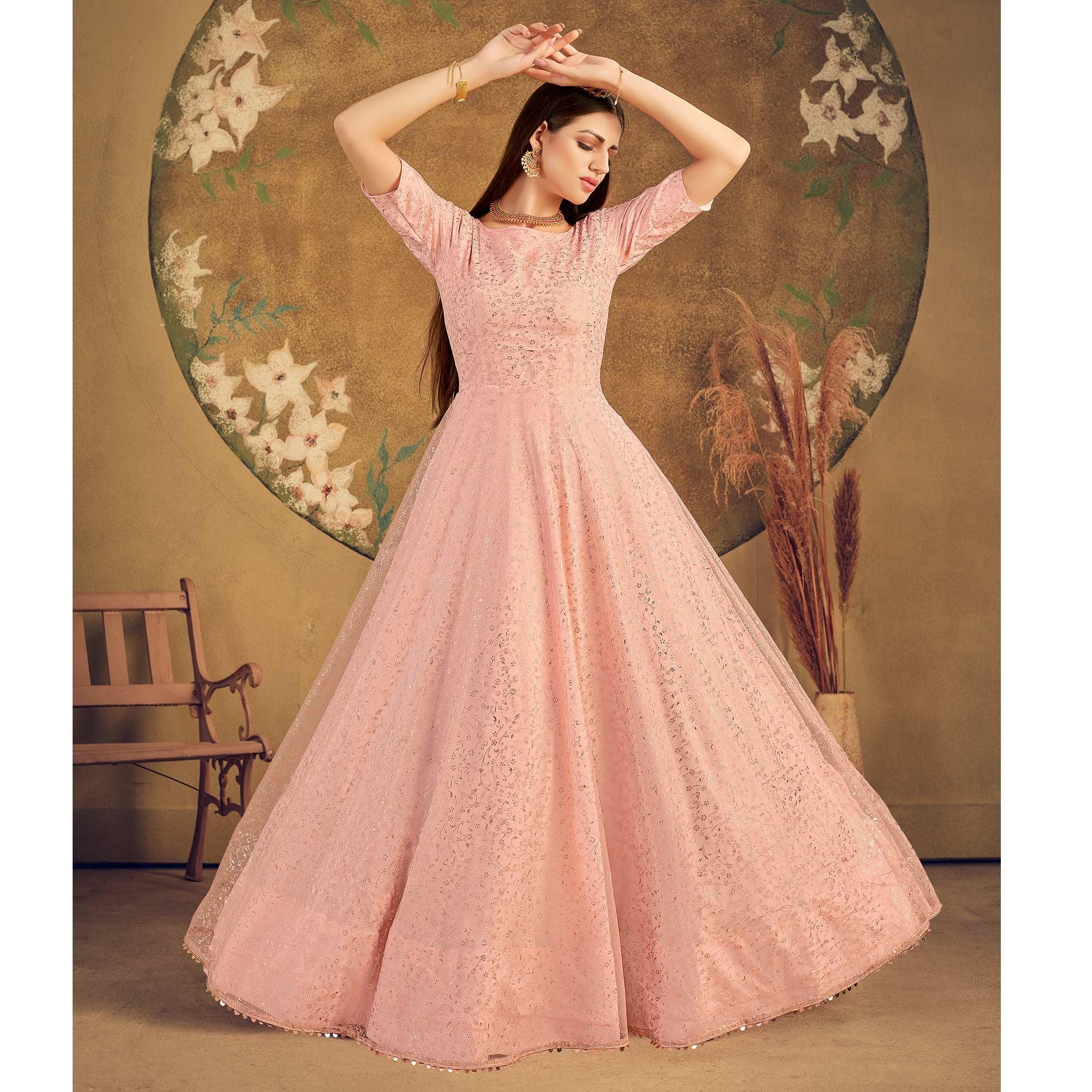 Pink satin and art organza net gown with sheer yoke only on Kalki